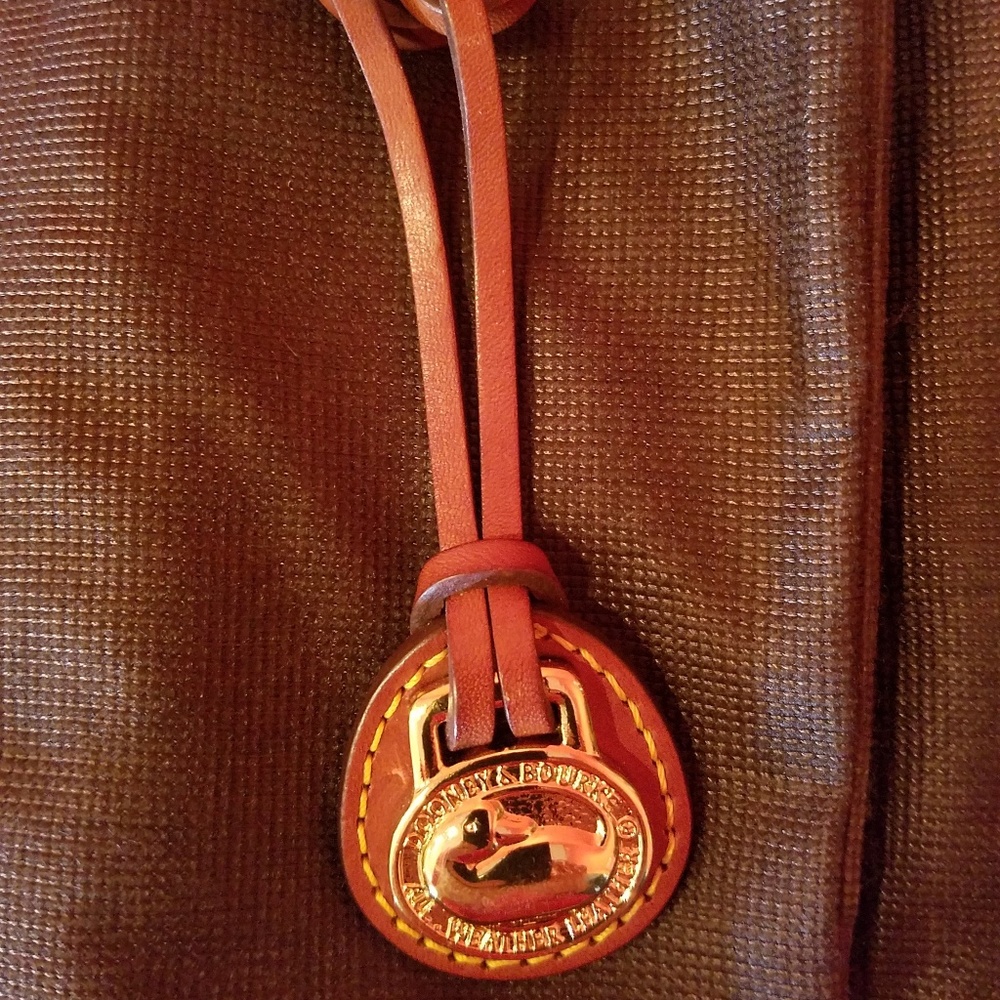 Dooney & Bourke bad hang tag. Brand new.